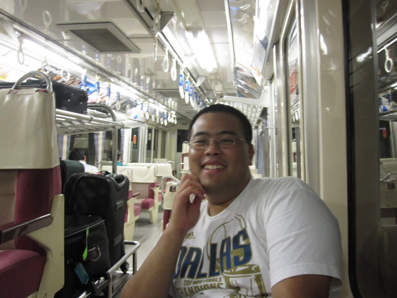 Self-Portrait on the Tokyo Monorail Tone T. Thangsongcharoen